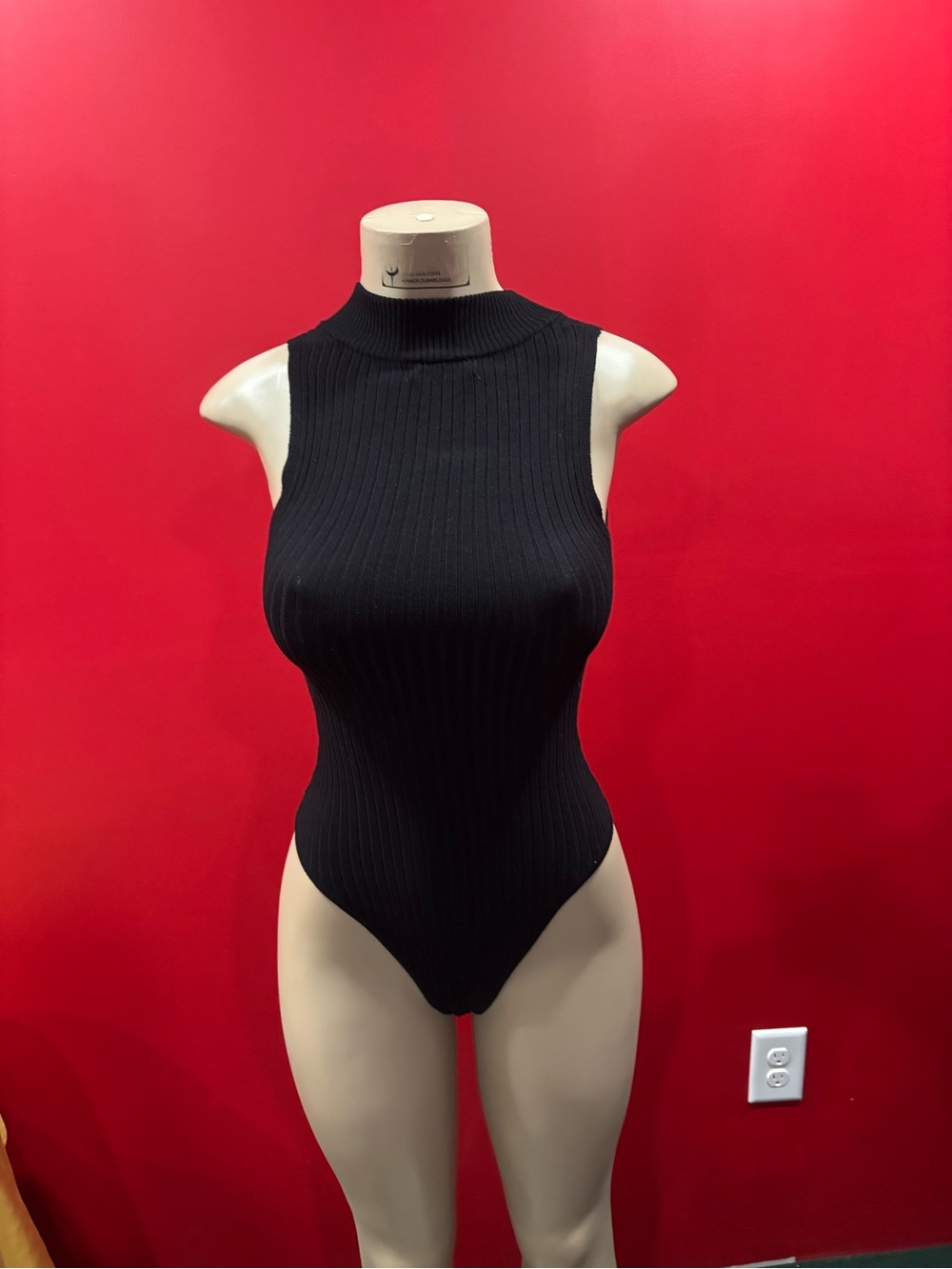 Better Be Black Ribbed High-Neck One-Piece bodysuit